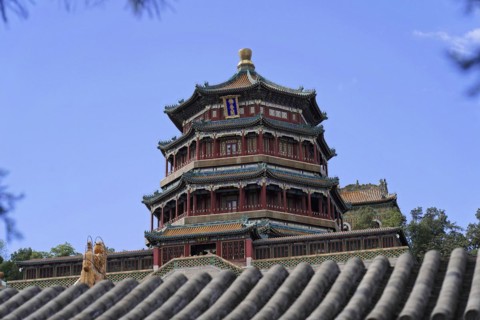 New Summer Palace, Beijing, China, Asia, A tall traditional Chinese tower rises above the trees