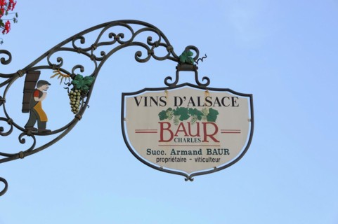 Eguisheim, Alsace, France, Europe, A metal wine sign with the inscription 'VINS D'ALSACE BAUR' in