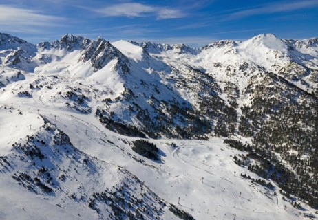 View of several mountain peaks and snowy landscapes with some trees visible, Grau Roig, Encamp,