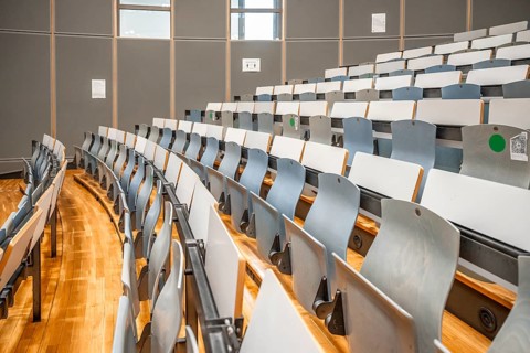 Rows of seats in an empty lecture theatre, interior photo, Department of Mechanical Engineering,