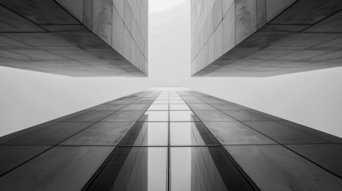 Upward perspective of a modern facade reflecting the sky, emphasizing vertical lines, AI generated