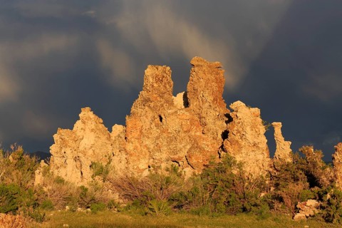 Dramatic rock formations against a cloudy sky at dusk, Mono Lake, North America, USA, South-West,