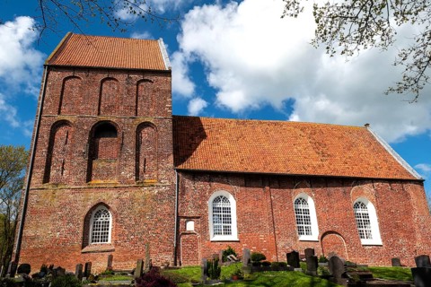 Protestant Reformed Church in Suurhusen, famous leaning church tower, municipality of Hinte,