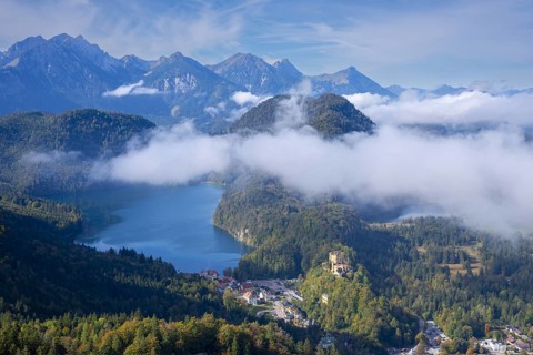 Hohenschwangau Castle, behind it Alpsee and Schwansee in autumn, Romantic Road, Ostallgaeu,