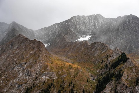 Snow and rocks, mountain valley, Chong Kyzyl Suu Valley, Terskey Ala Too, Tien-Shan Mountains,