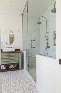 Green antique finish pine wood vanity with rustic wood plank countertop and white top-mounted