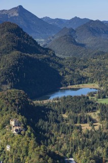 Hohenschwangau Castle and Schwansee in autumn, Romantic Road, Ostallgaeu, Allgaeu, Bavaria,