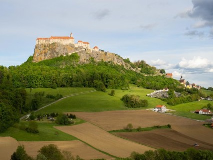 Riegersburg in the evening light, foreground farmland, Riegersburg, Styrian volcanic region,