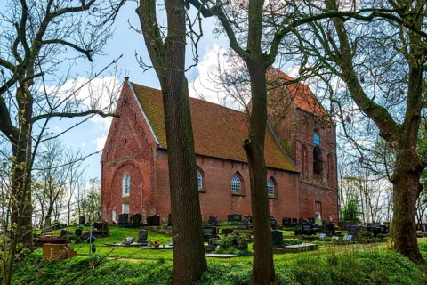 Protestant Reformed Church in Suurhusen, famous leaning church tower, municipality of Hinte,
