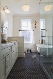 White antique style finish vanity with quartz countertop and two sunken sinks, freestanding claw