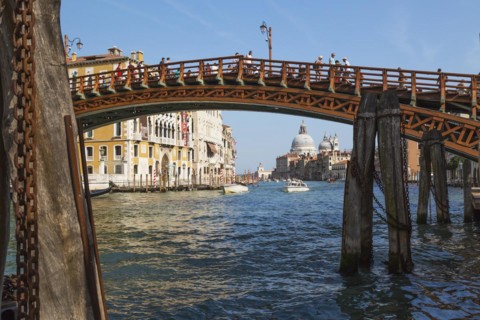 Accademia footbridge over Grand Canal with water taxis, Renaissance architectural style residential