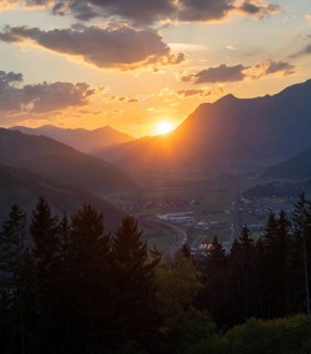 Sunset over the Liesingtal, in the evening light the village of Traboch, Schoberpass federal road,