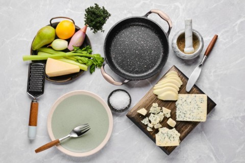 Top view of ingredients for risotto with pink rice, pear and blue cheese