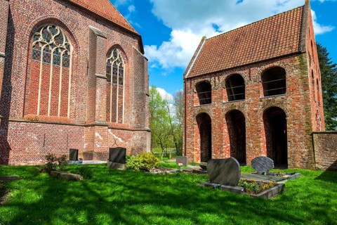Protestant Reformed Church in Suurhusen, famous leaning church tower, municipality of Hinte,