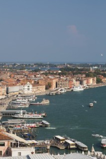 Water taxis and vaporettos along the Riva degli Schiavoni promenade plus old Renaissance