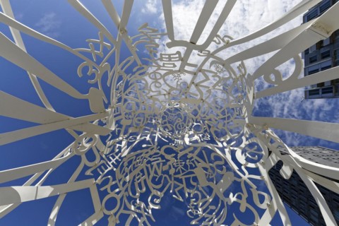 Public art, frog perspective of source sculpture by Jaume Plensa, Montreal, Province of Quebec,