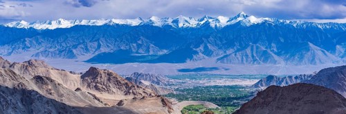 Panorama from the Khardong Pass, the second highest motorway pass in the world, over Leh and the