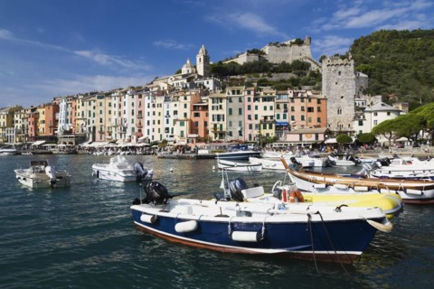 Harbour with fishing boats and colourful apartment building facades at Portovenere, La Spezia