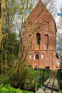 Protestant Reformed Church in Suurhusen, famous leaning church tower, municipality of Hinte,