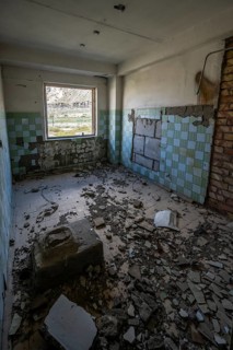 Abandoned ruined room with fallen tiles, ghost town, Engilchek, Tian Shan, Kyrgyzstan, Asia