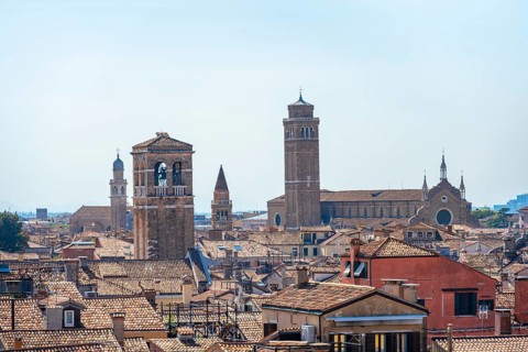 View over the roofs of Venice with church towers and church, view from the roof of the Fondaco dei