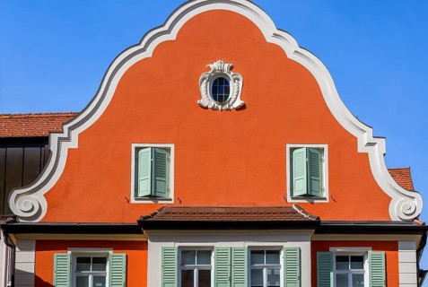 Red facade with tail gable, Kaufbeuern, Allgaeu, Swabia, Bavaria, Germany, Europe