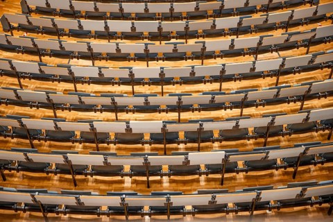 View from above of empty rows of seats in a lecture theatre, interior photo, Department of