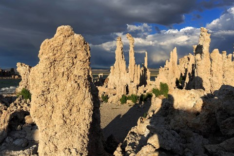 Large tufa columns under a dramatic sky with shadows, Mono Lake, North America, USA, South-West,
