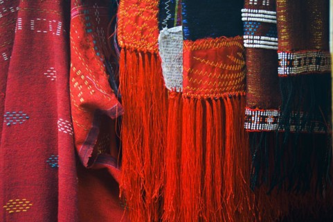 Close-up of traditional Ulos clothes of the Batak people with fringe and intricate indigenous