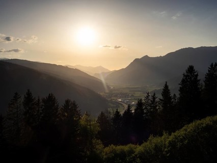 Evening light at sunset over the Liesingtal, in the evening light the village of Traboch,