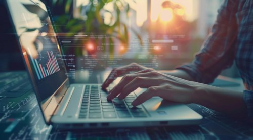 Concept of productivity. Businessman uses laptop to analyze marketing and productivity data, AI