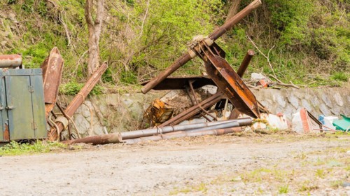 Closeup of large rusted metal anchor used on large fishing vessels in NamHae, South Korea, Asia
