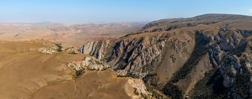 Moldo-Ashuu Pass, mountain landscape with steep rocks between yellow hills, near Baetov, Naryn