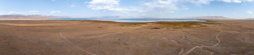 Aerial view, Vast empty landscape at the mountain lake Song Kul in autumn, Moldo Too Mountains,