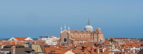 View over the roofs of Venice to the church Basilica dei Santi Giovanni e Paolo, view from the roof