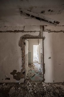 Abandoned destroyed flat with rubble ghost town, Engilchek, Tian Shan, Kyrgyzstan, Asia