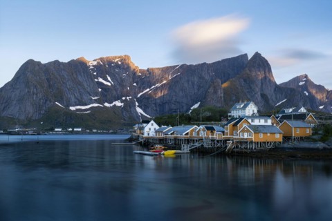 The village of Sakrisoy with its typical yellow or ochre-coloured wooden houses on wooden stilts