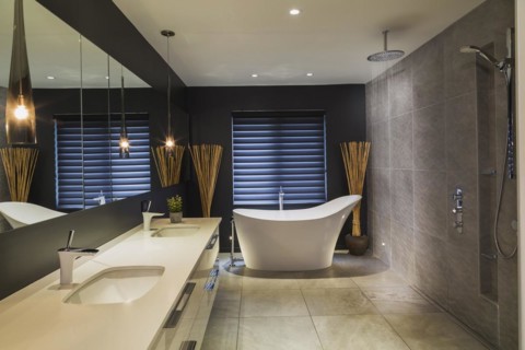 White high-gloss lacquered vanity with quartz countertop and his and her sunken sinks, freestanding