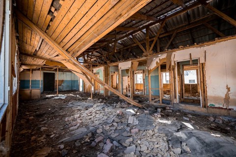Destroyed abandoned classroom in the old Soviet school, ghost town, Engilchek, Tian Shan,