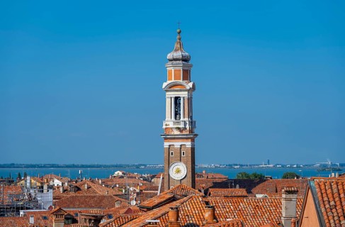 View over the roofs of Venice to the church tower of the Chiesa Parrocchiale dei Santi Apostoli,