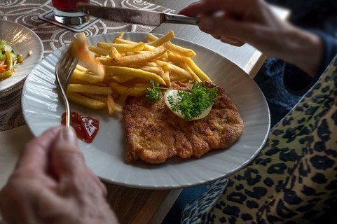 Pork schnitzel with French fries served in a pub, Franconia, Bavaria, Germany, Europe