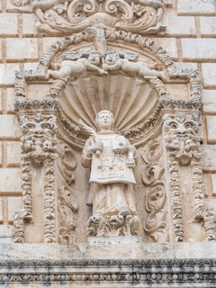 Figure of a saint, relief on the facade of San Nicola Cathedral, Cattedrale Turritana Sassari,