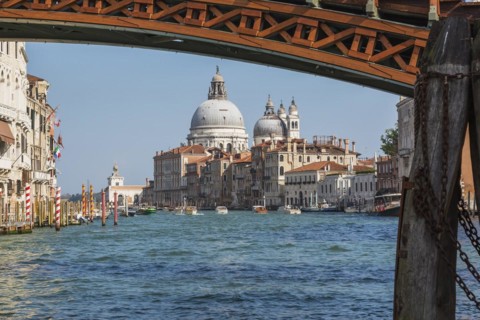Accademia footbridge over Grand Canal with water taxis, Renaissance architectural style residential