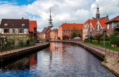 Am Roten Siel, view towards the city centre, town hall tower in the background on the right, Emden,