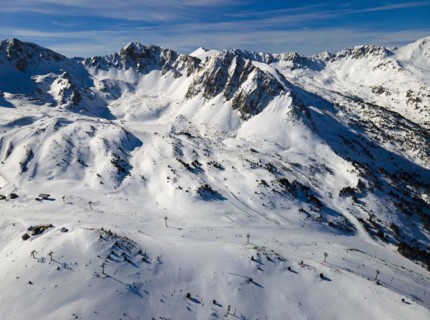 Panoramic view of snow-covered mountains with ski lifts, Grau Roig, Encamp, Andorra, Pyrenees,