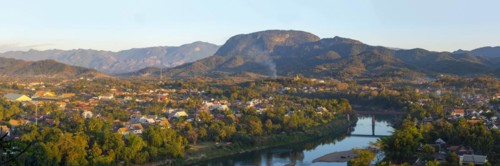 Panorama over Luang Prabang with Nam Khan River and Wat Phol Pao in the background, Laos, Asia