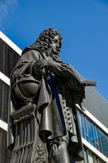 Inner courtyard of Leipzig University with the monument to Gottfried Wilhelm Leibniz, Leipzig,