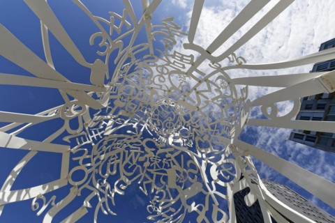 Public art, frog perspective of source sculpture by Jaume Plensa, Montreal, Province of Quebec,