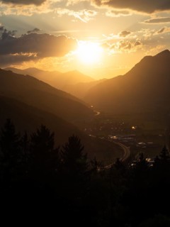 Sunset over the Liesingtal, in the evening light the village of Traboch, Schoberpass federal road,
