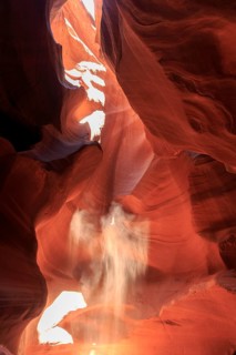 Sunbeams dance on the eroded surfaces of a narrow canyon, Upper Antelope Canyon, North America,